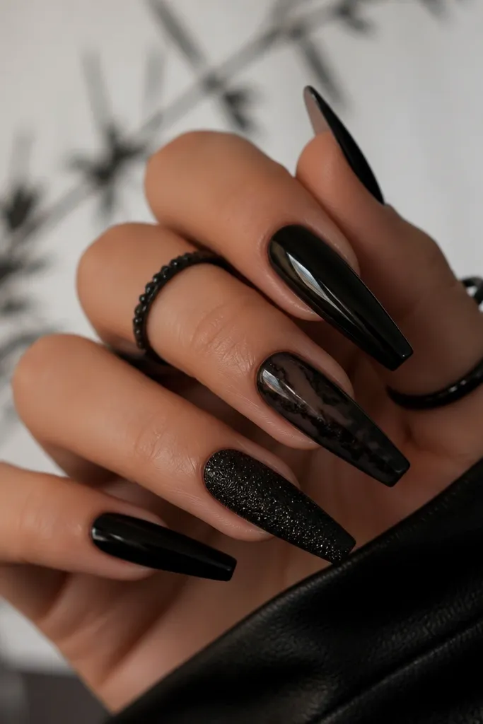 Black nail extension designs for a sleek and edgy look